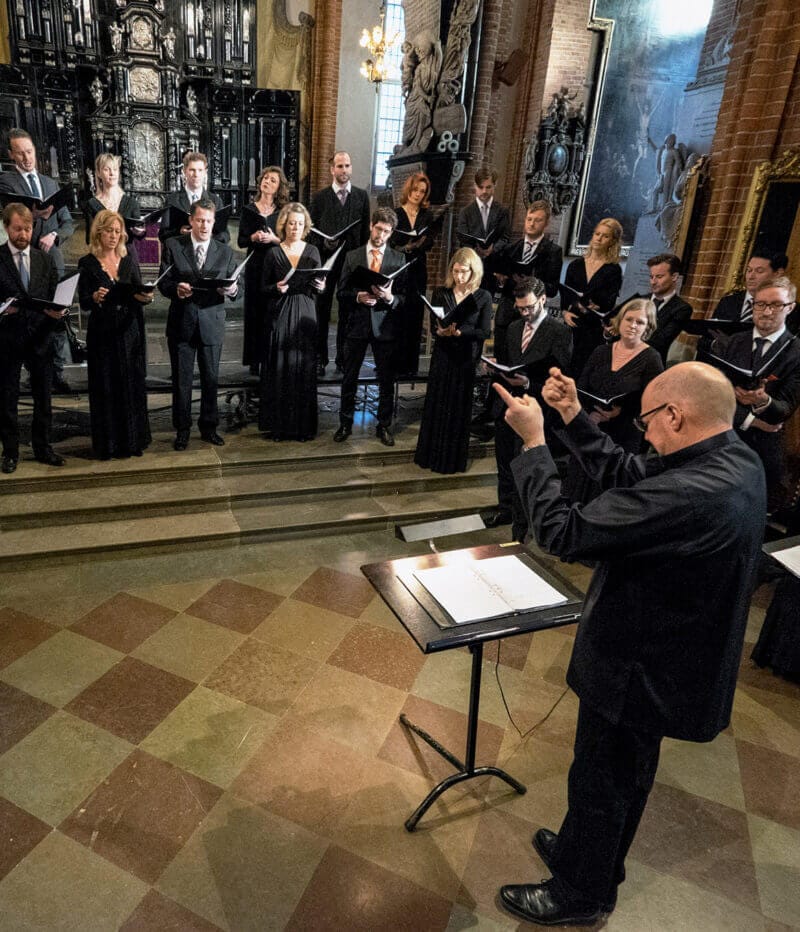 Foto av S:t Jacobs Kammarkör från ett framträdande i en kyrka