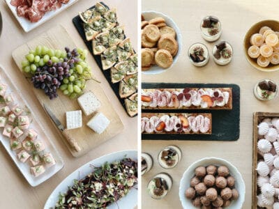 Två tallrikar med olika aptitretare, med ost, vindruvor och små tartiner till vänster, och ett sortiment av desserter, inklusive tårtor, maränger och tryffel till höger.